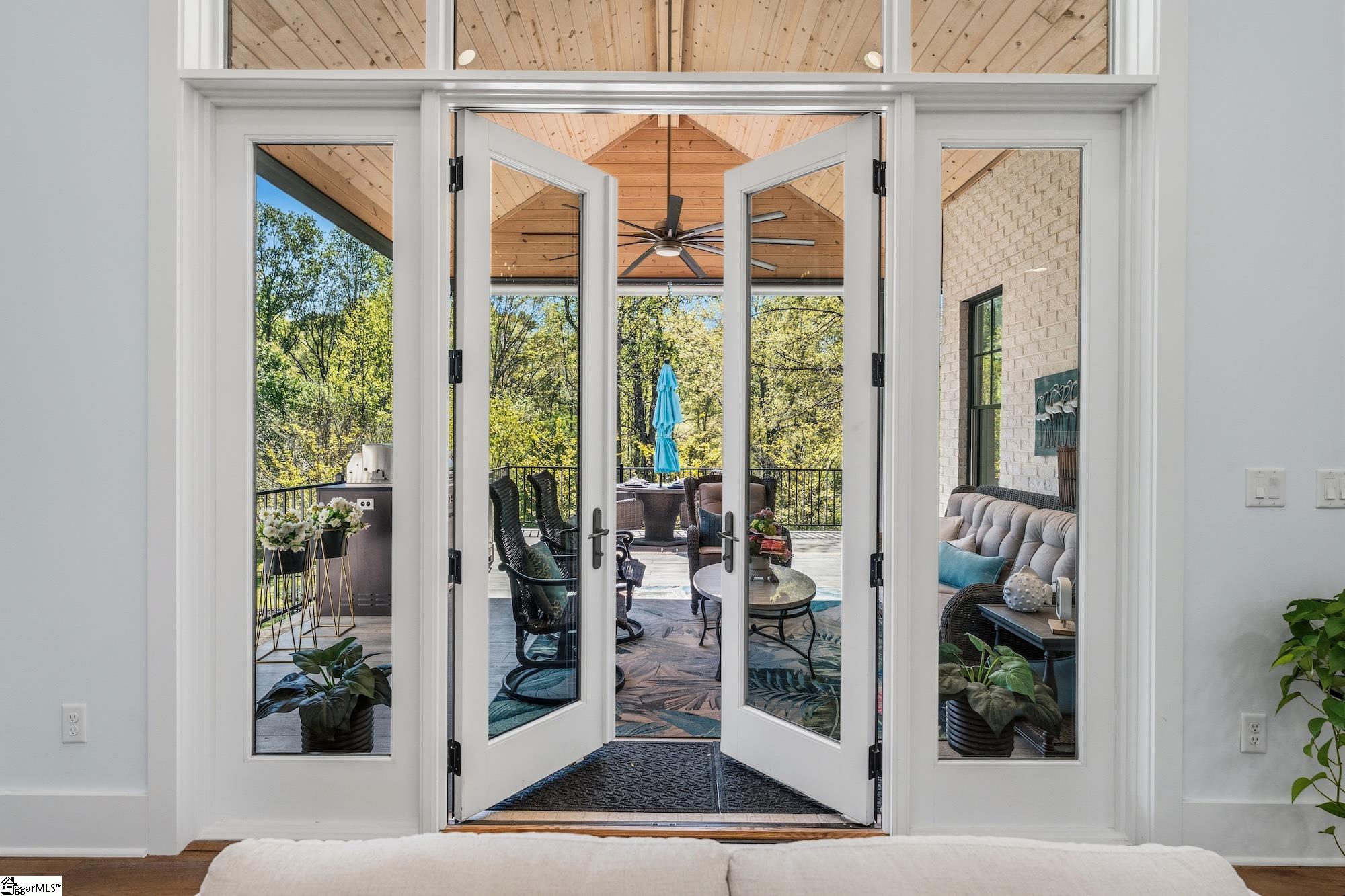158 Tully Drive Anderson, SC 29621 - Photo 31 of 49 Stunning covered porch with tile flooring, vaulted tongue and groove ceiling with fan, outdoor kitchen