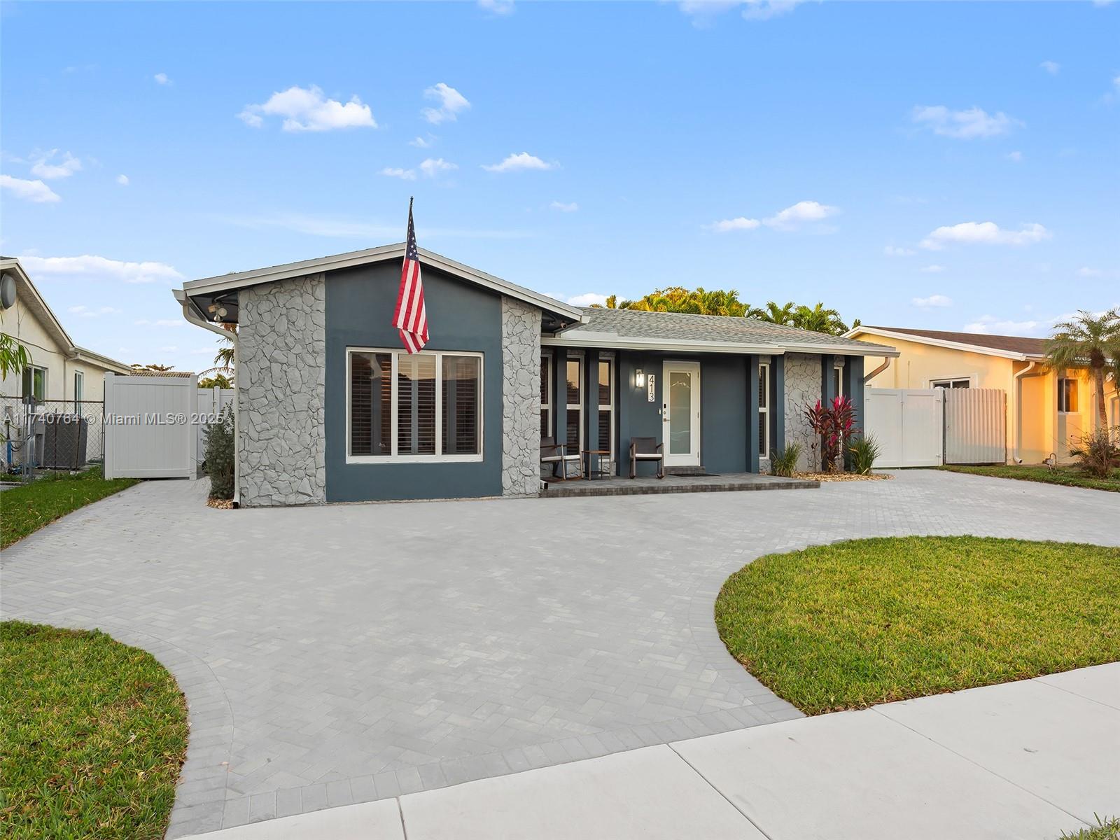 413 Southeast 4th Terrace Dania Beach, FL 33004 - Photo 2 of 25 a view of a house with swimming pool and sitting area