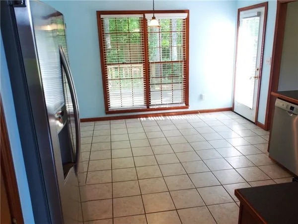 a view of an empty room and window
