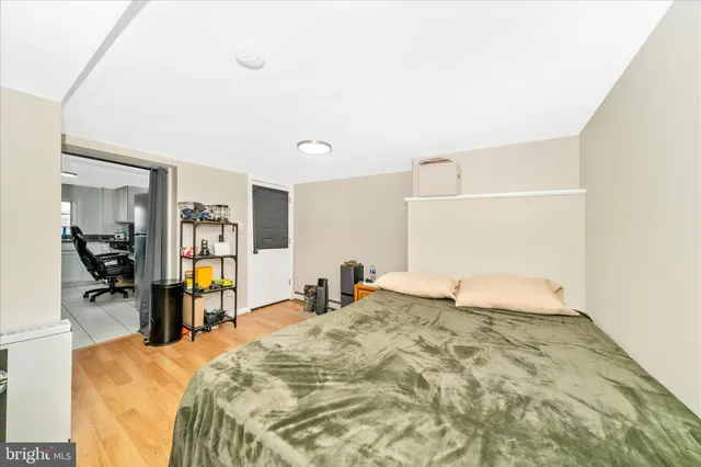 a view of a balcony with wooden floor and fence