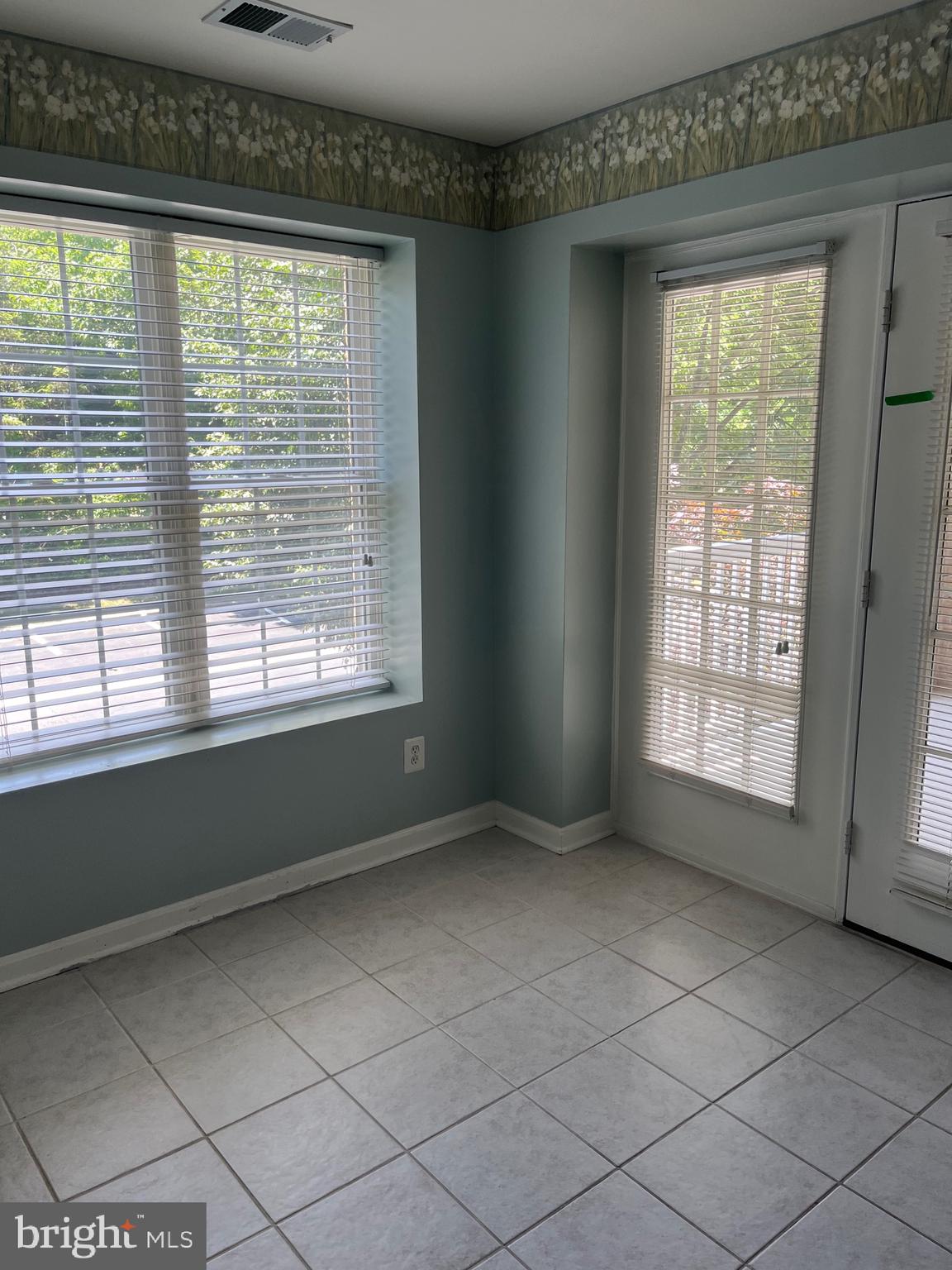 12320 Rosslare Ridge Road, Unit 202 Lutherville-Timonium, MD 21093 - Photo 23 of 35 Atrium doors to balcony