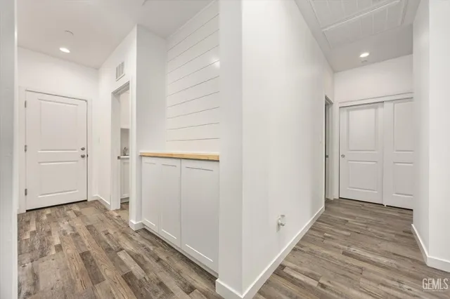 a bathroom with a sink a mirror and a shower
