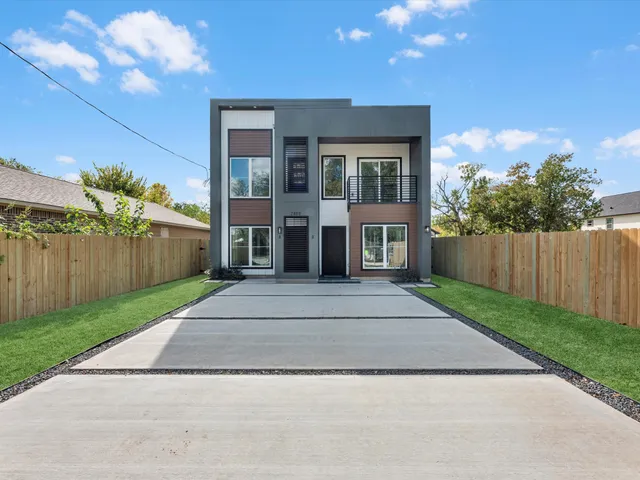 a view of house with outdoor space and street view