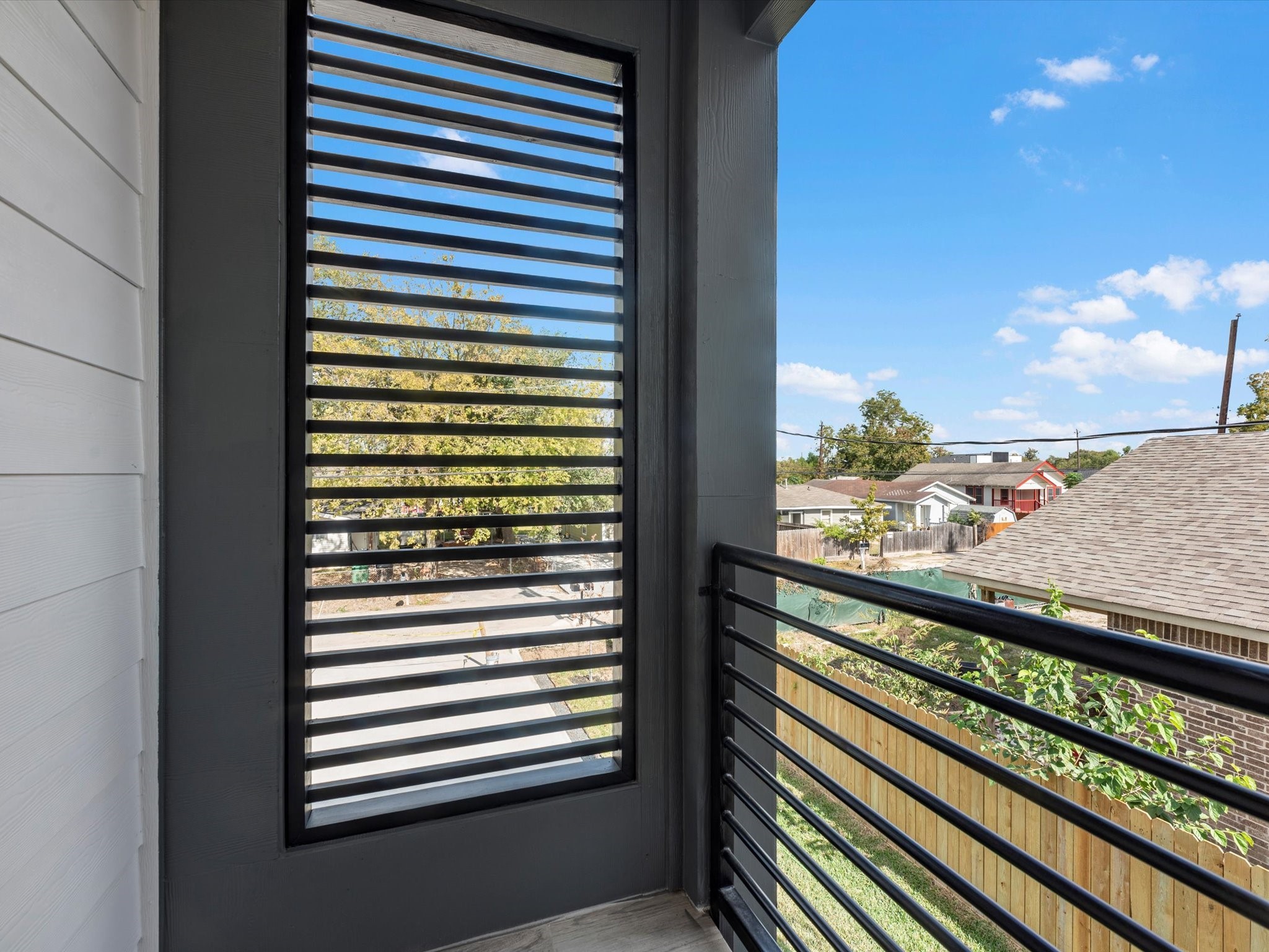 7802 Queen Street, Unit A Houston, TX 77028 - Photo 15 of 40 a view of a city from a balcony
