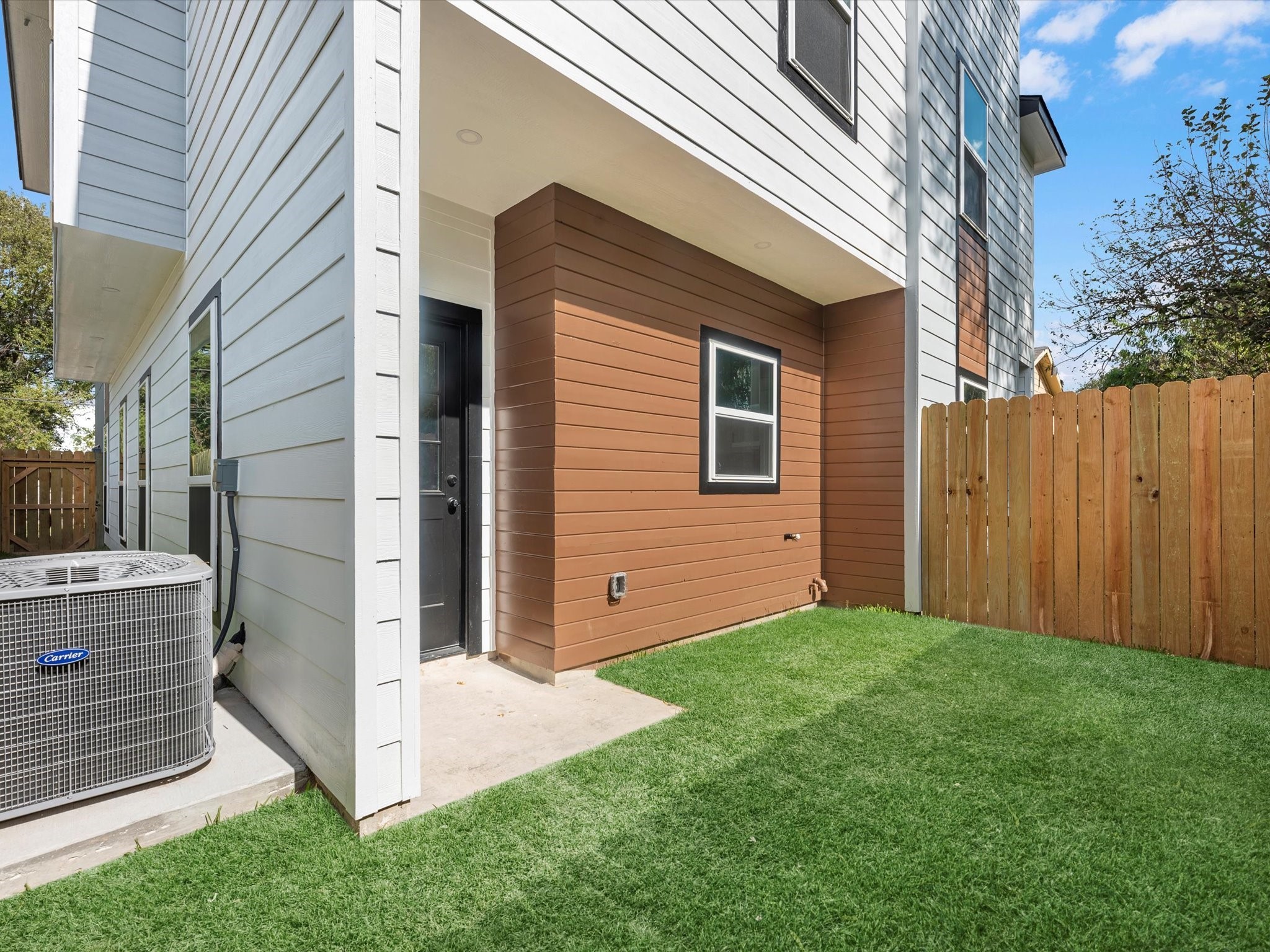 7802 Queen Street, Unit A Houston, TX 77028 - Photo 40 of 40 a view of backyard with barbeque grill and wooden fence
