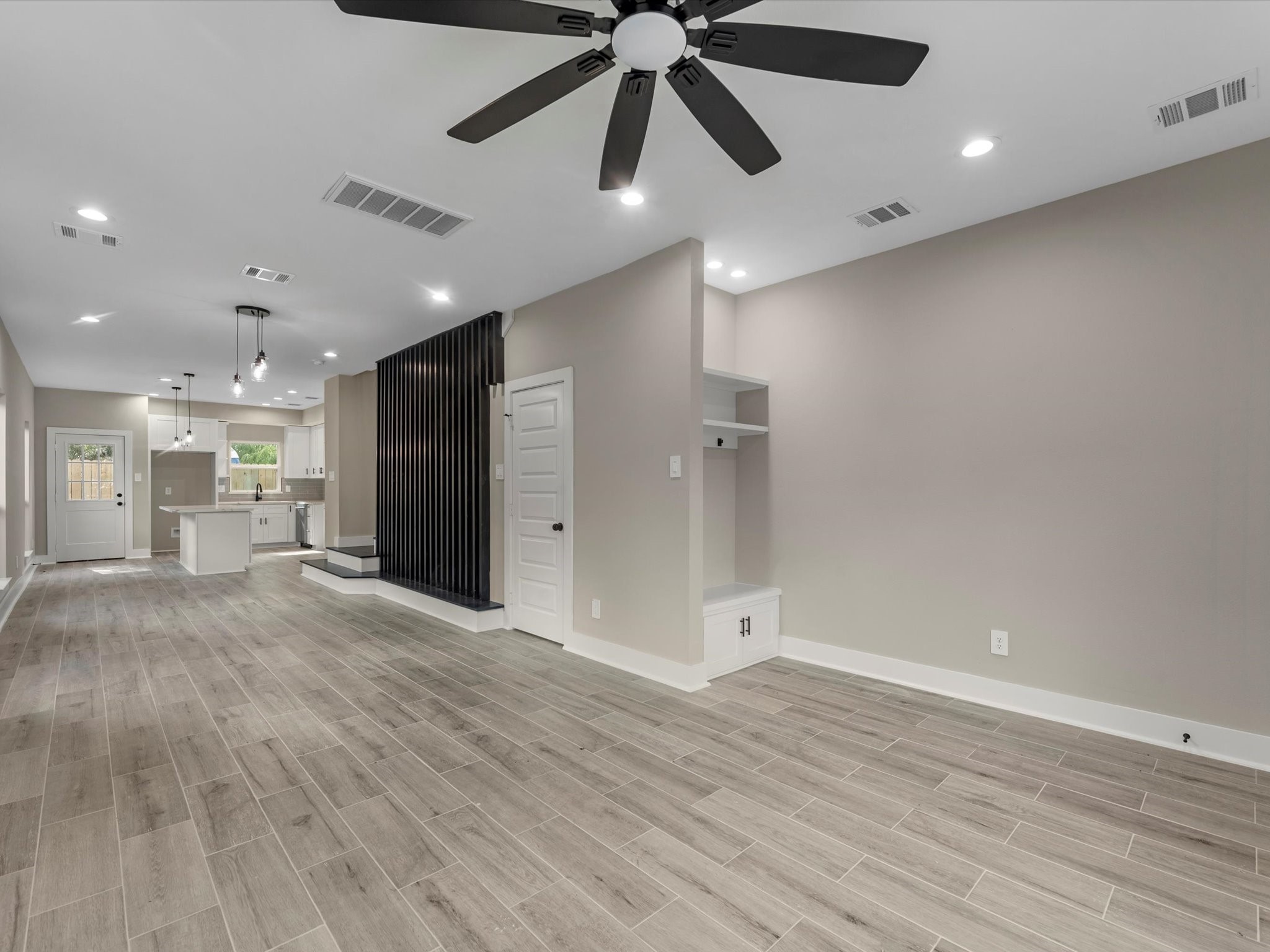 7802 Queen Street, Unit A Houston, TX 77028 - Photo 5 of 40 a view of an empty room and kitchen view
