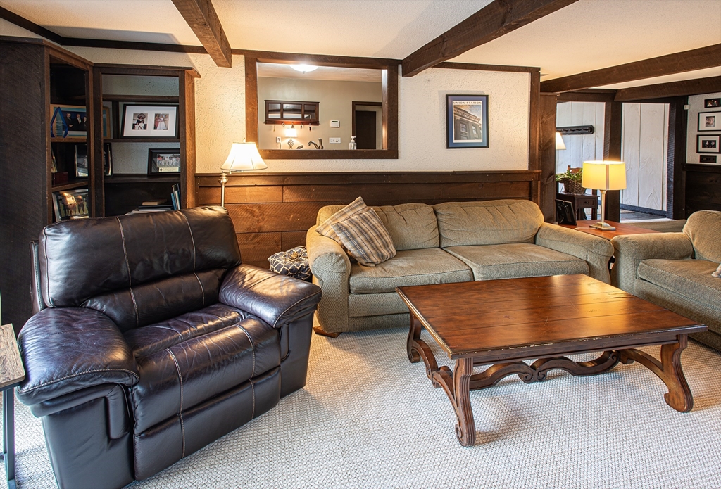 54 South Shore Drive Springfield, MA 01118 - Photo 16 of 39 a living room with furniture and a couch