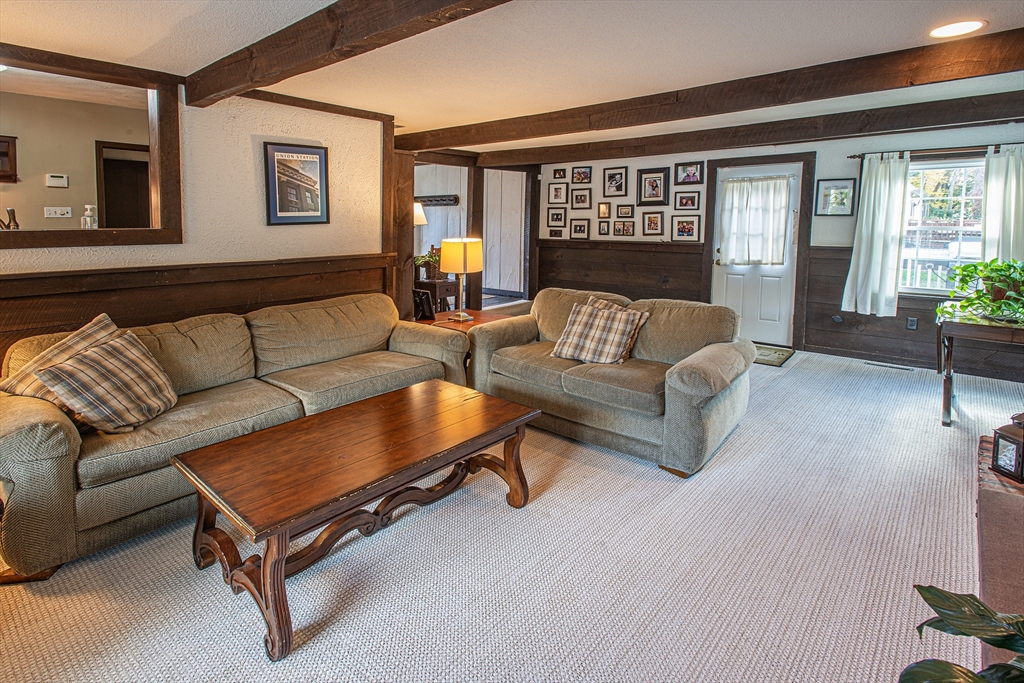 54 South Shore Drive Springfield, MA 01118 - Photo 17 of 39 a living room with furniture and a large window
