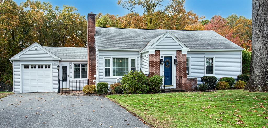 54 South Shore Drive Springfield, MA 01118 - Photo 2 of 39 a front view of a house with garden