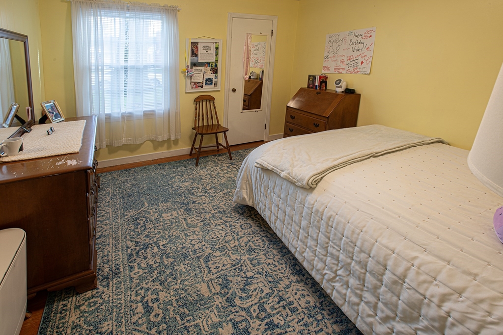 54 South Shore Drive Springfield, MA 01118 - Photo 23 of 39 a bed room with a bed and a window