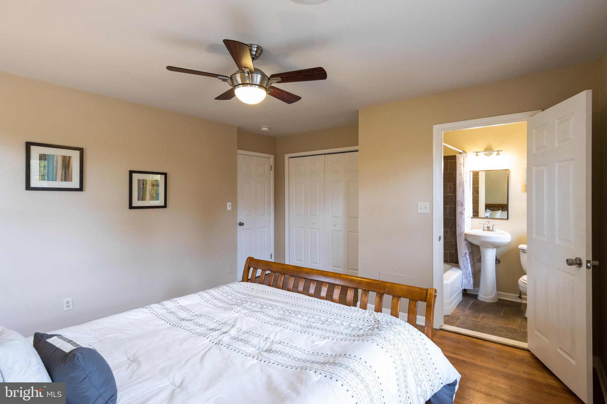 601 Squires Road Towson, MD 21286 - Photo 13 of 47 Master Bath - Wood Flooring & Ceiling Fan