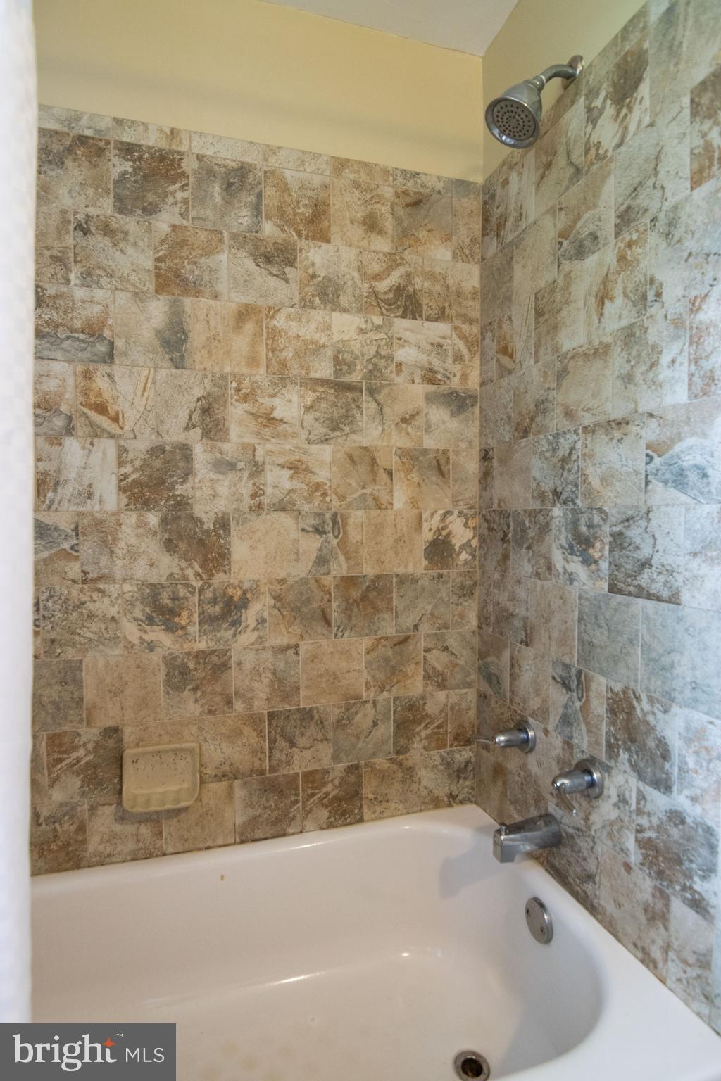 601 Squires Road Towson, MD 21286 - Photo 31 of 47 Ceramic Tile flooring and surround in all Baths