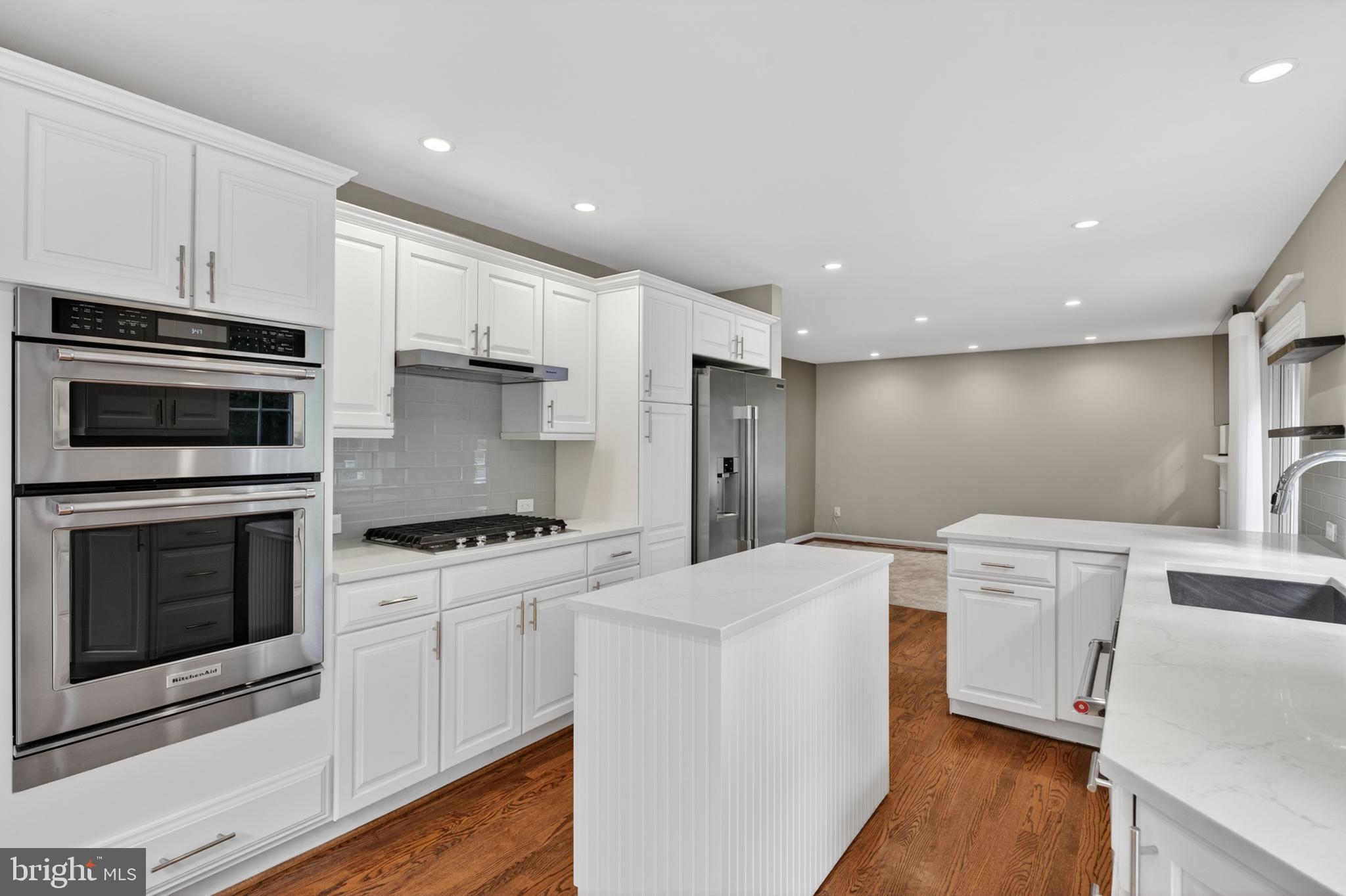 6 Nearfield Road Lutherville-Timonium, MD 21093 - Photo 20 of 71 a kitchen with stainless steel appliances a stove a sink and a refrigerator