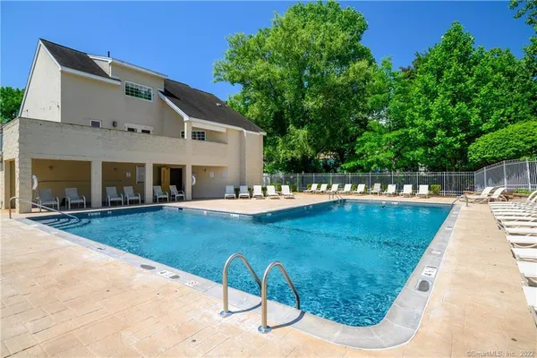 a view of a house with swimming pool