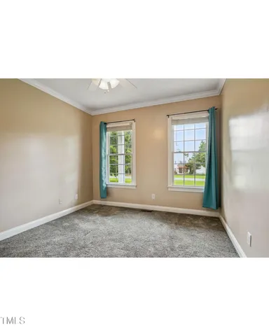 a bathroom with a sink double vanity and a mirror
