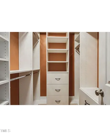 a backyard of a house with large trees