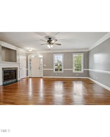 a view of pool window and wooden floor