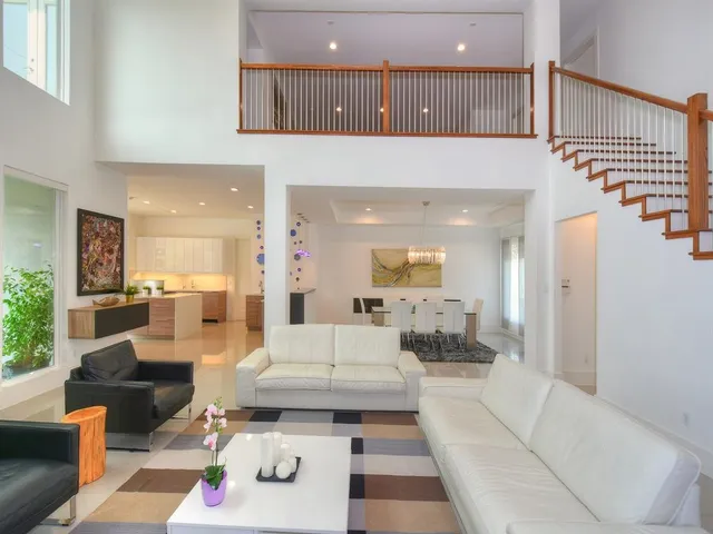 a living room with furniture and a table