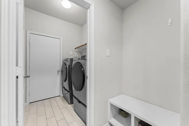 a utility room with dryer and washer