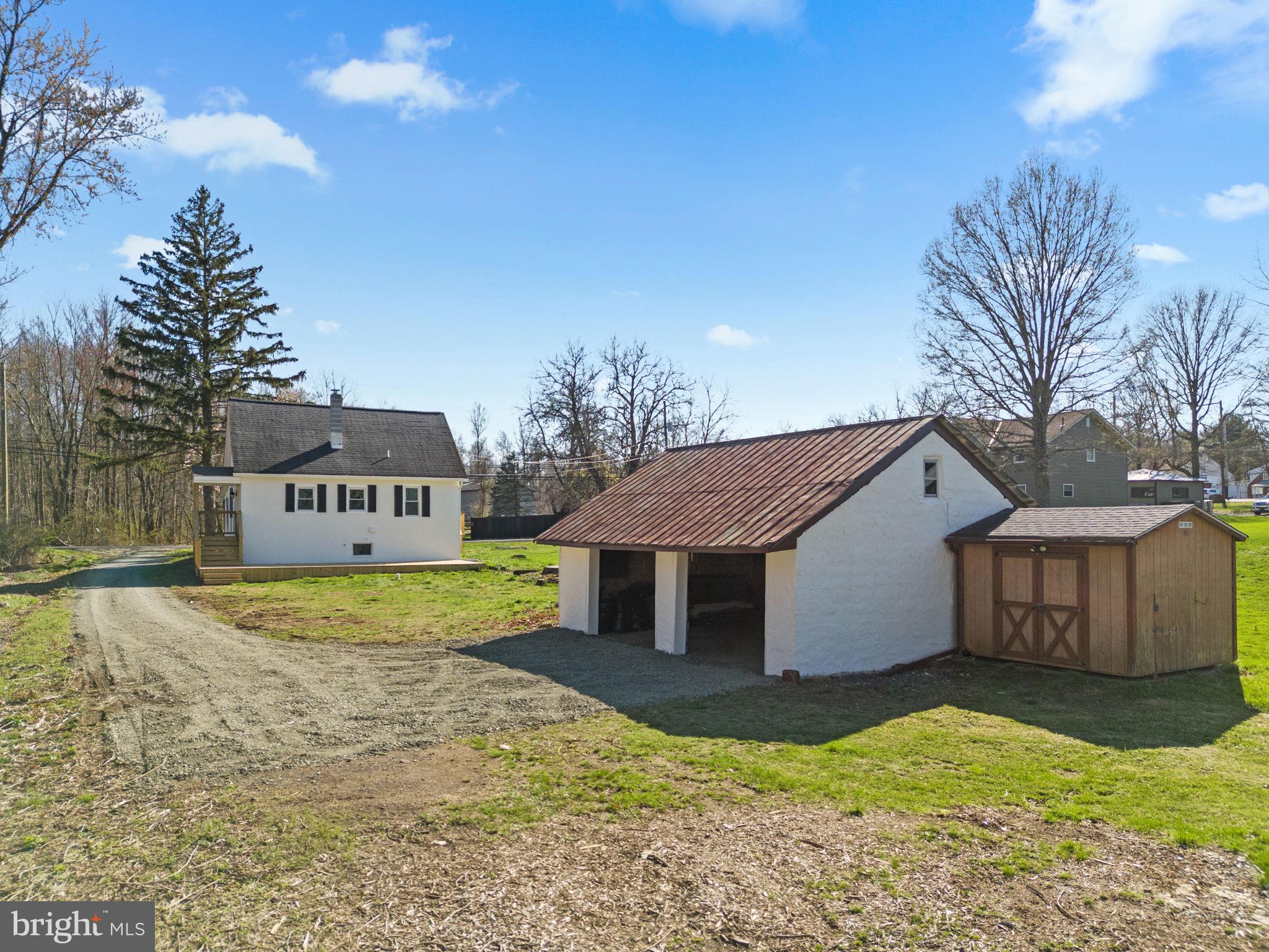 2042 Upper Ridge Road Green Lane, PA 18054 - Photo 35 of 41 Back View with Detached Garage and Shed/Workshop