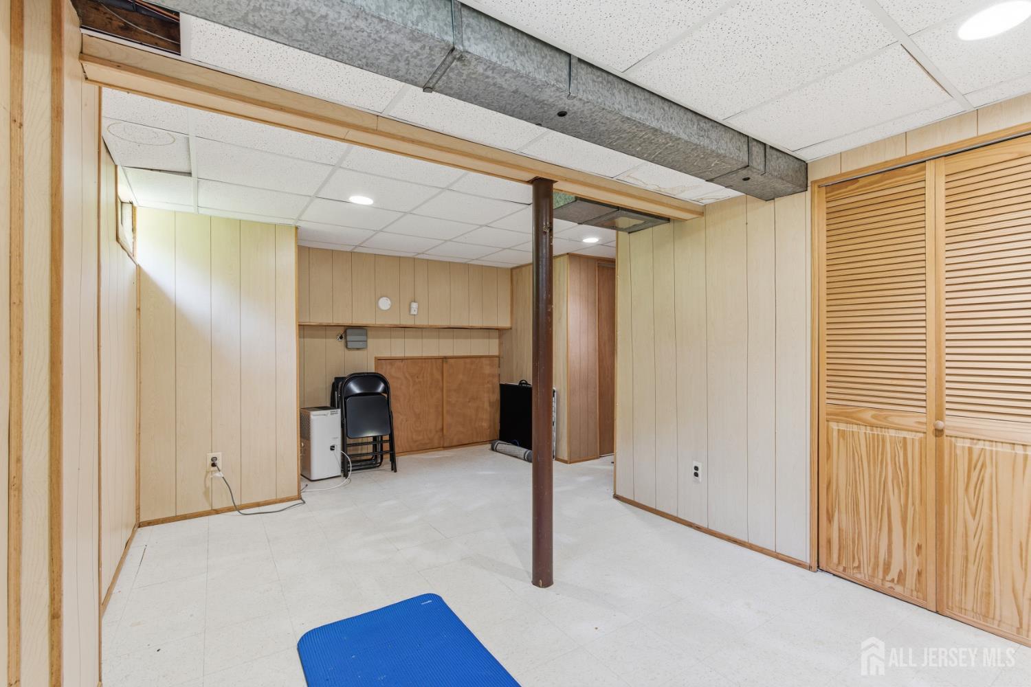 213 Normandy Road Edison, NJ 08820 - Photo 37 of 45 a view of a room with gym equipment