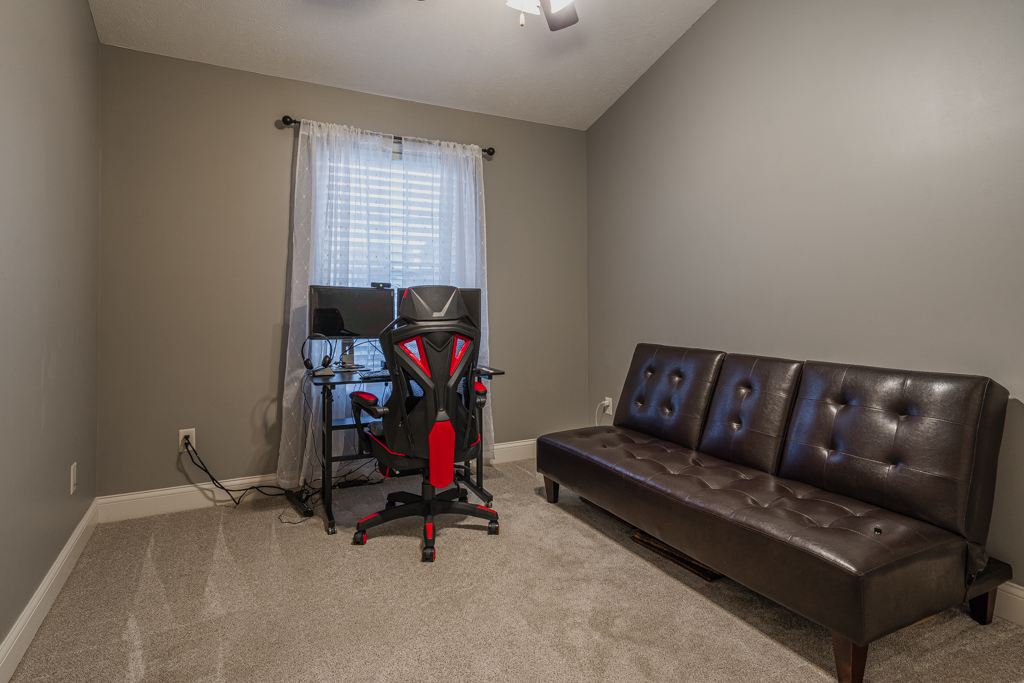 5107 Longfield Road Bloomington, IL 61705 - Photo 19 of 25 a living room with furniture and a window