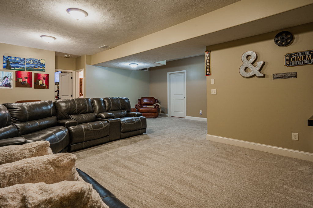 5107 Longfield Road Bloomington, IL 61705 - Photo 21 of 25 a living room with furniture and a couch