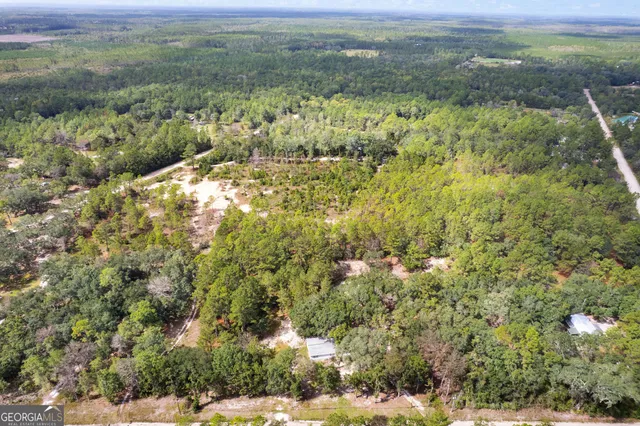a view of a yard with an outdoor space