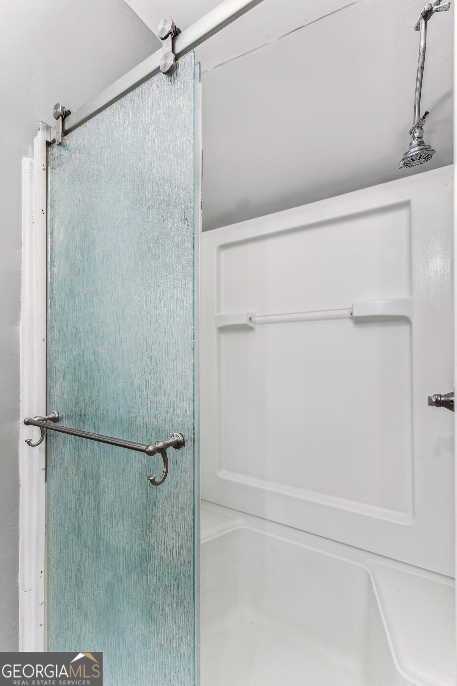 68 Amber Drive Waverly, GA 31565 - Photo 28 of 39 a bathroom with a shower