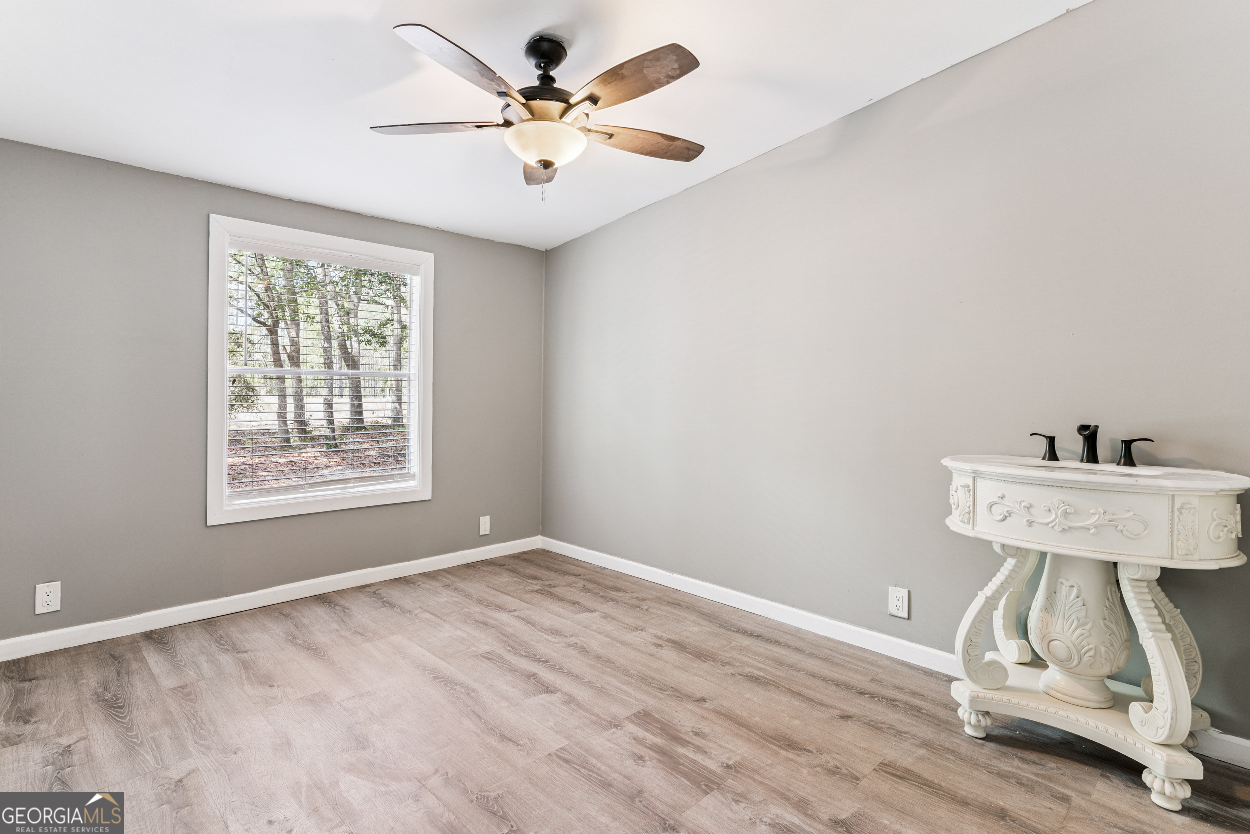 68 Amber Drive Waverly, GA 31565 - Photo 34 of 39 a view of an empty room with a window