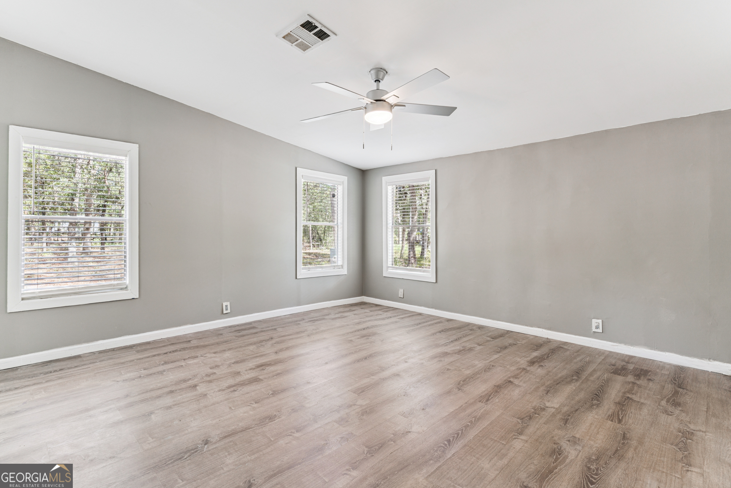68 Amber Drive Waverly, GA 31565 - Photo 35 of 39 a view of an empty room with a window