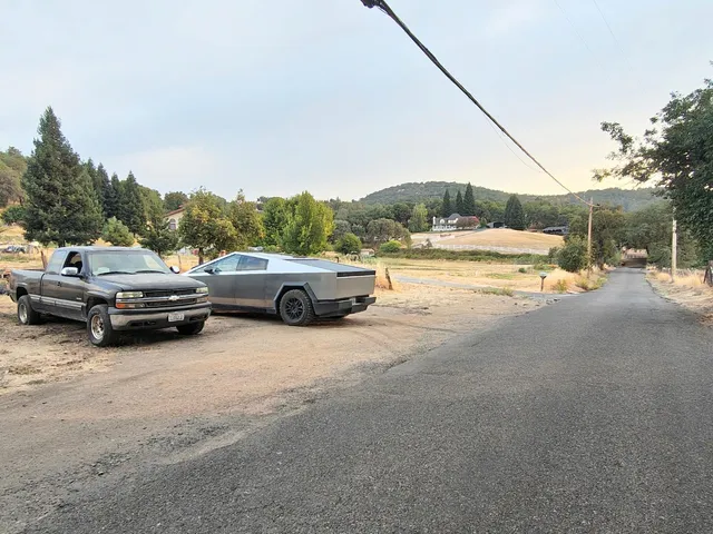 a house with trees in the background