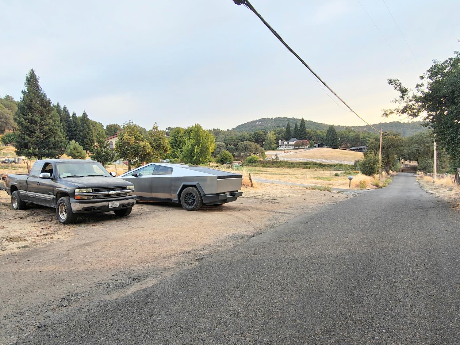 5661 Thompson Hill Road Placerville, CA 95667 - Photo 48 of 68 a view of a city street with a car parked on the road