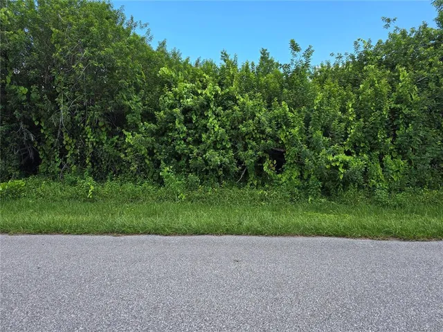 a view of a house with a street