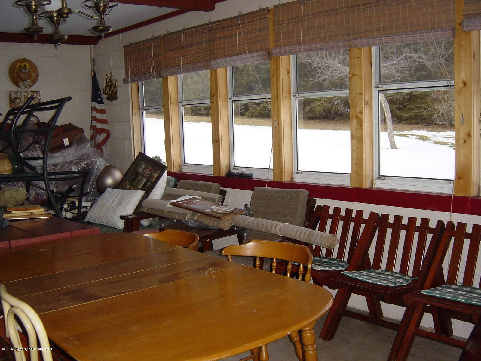 17 T Rte 318 Moscow, PA 18444 - Photo 24 of 30 a living room with furniture a table and a large window