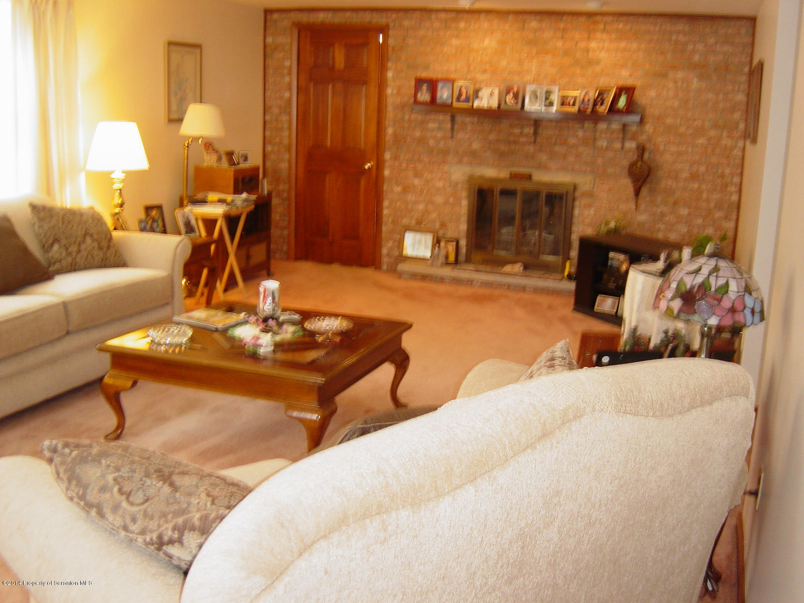 17 T Rte 318 Moscow, PA 18444 - Photo 10 of 30 a living room with furniture and a fireplace