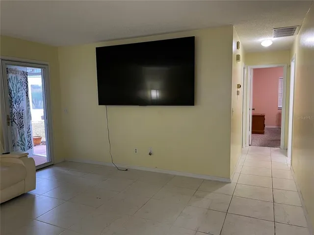 a view of livingroom with hardwood floor and window