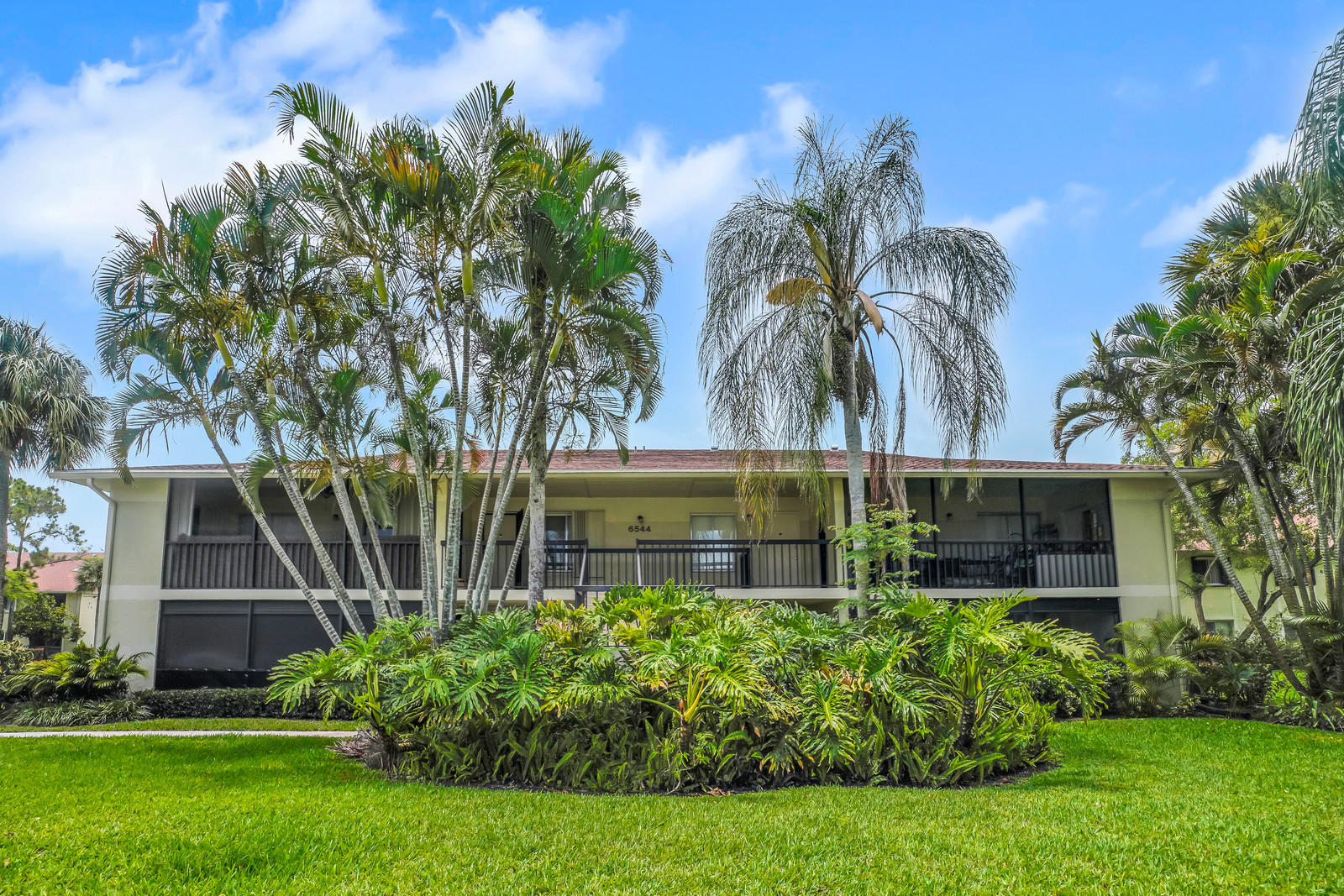 a view of a house with a garden