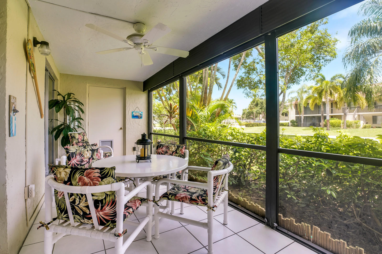 6544 Chasewood Drive, Unit D Jupiter, FL 33458 - Photo 15 of 16 a view of a dining room with furniture window and outside view