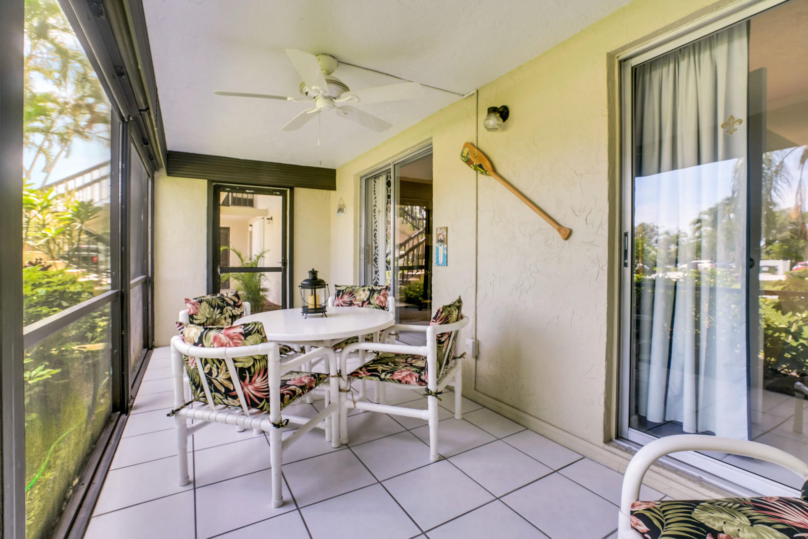 6544 Chasewood Drive, Unit D Jupiter, FL 33458 - Photo 16 of 16 a view of a dining room with furniture window and outside view