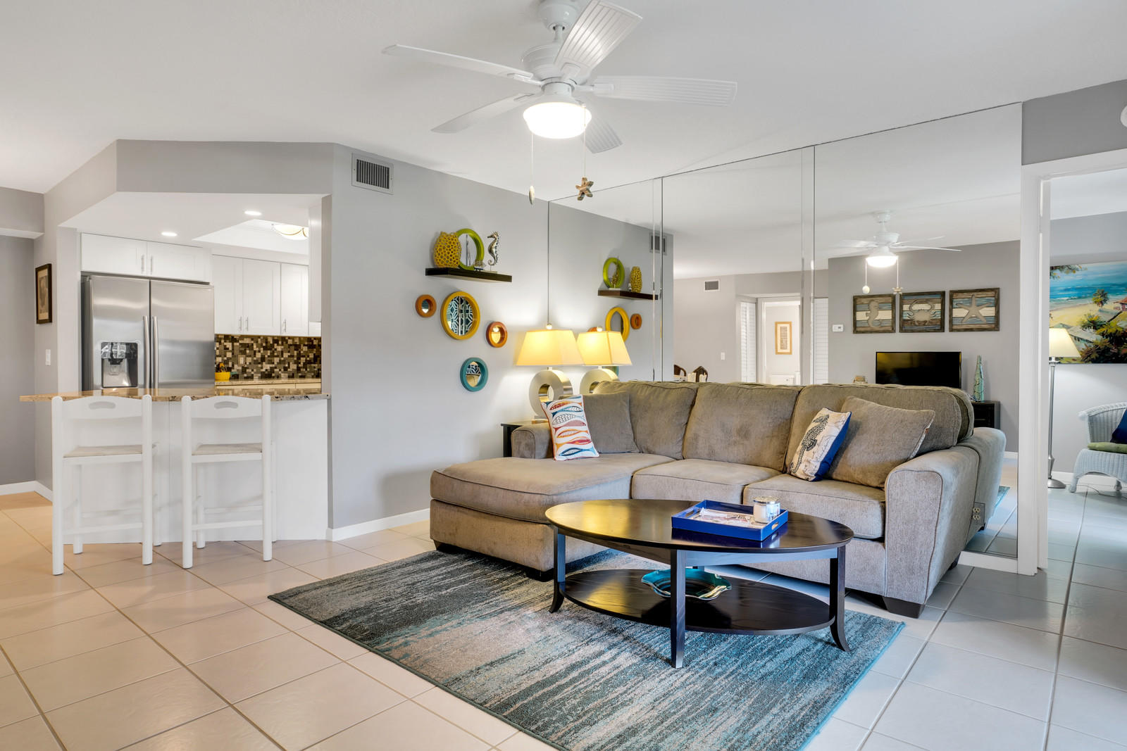 6544 Chasewood Drive, Unit D Jupiter, FL 33458 - Photo 6 of 16 a living room with furniture and wooden floor