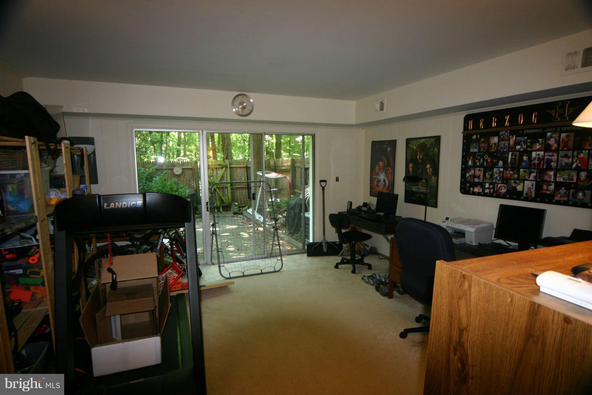 5915 Kingsford Road, Unit 365 Springfield, VA 22152 - Photo 13 of 17 a bedroom with furniture and a large window