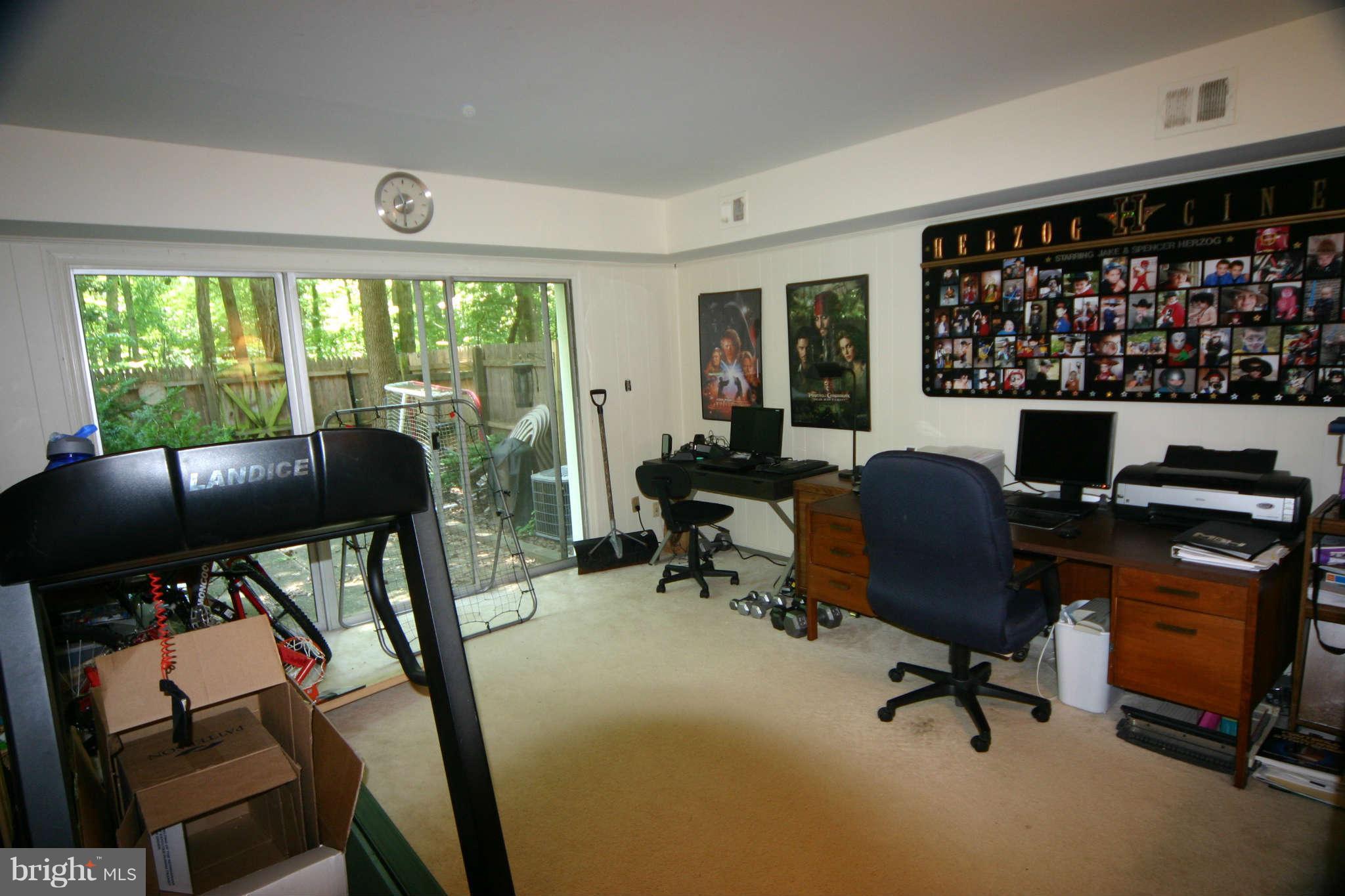 5915 Kingsford Road, Unit 365 Springfield, VA 22152 - Photo 14 of 17 a view of a workspace with furniture and a window