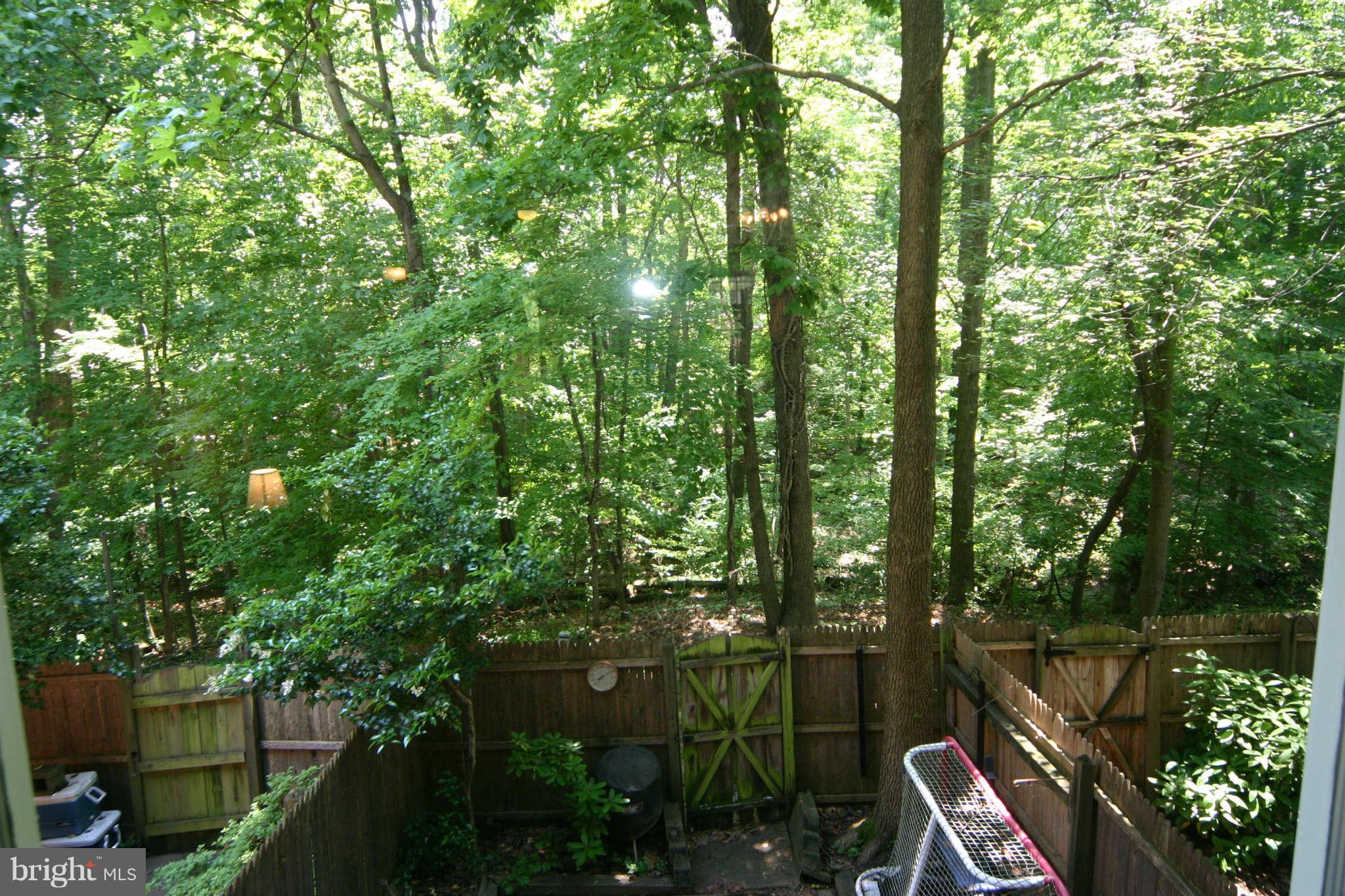5915 Kingsford Road, Unit 365 Springfield, VA 22152 - Photo 17 of 17 a view of a city with lush green forest