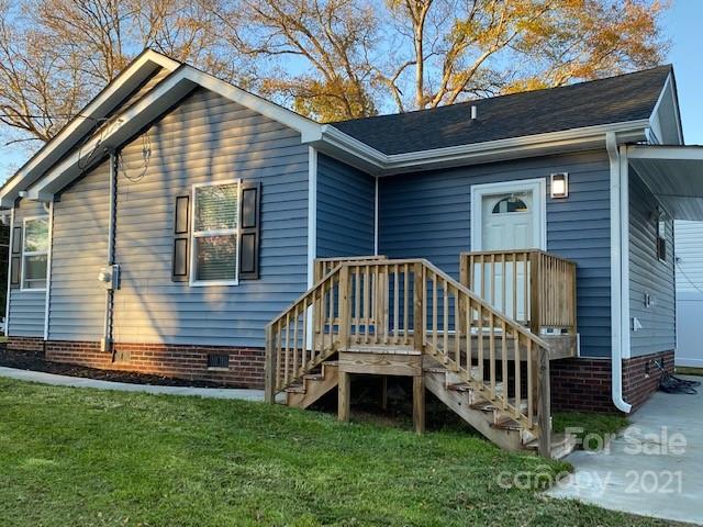 1599 Springdale Road Lancaster, SC 29720 - Photo 2 of 28 a view of house with a yard and deck