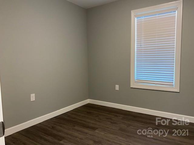 1599 Springdale Road Lancaster, SC 29720 - Photo 20 of 28 a view of a room that has wooden floor and a window