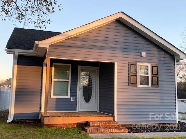 1599 Springdale Road Lancaster, SC 29720 - Photo 25 of 28 a front view of a house with garden