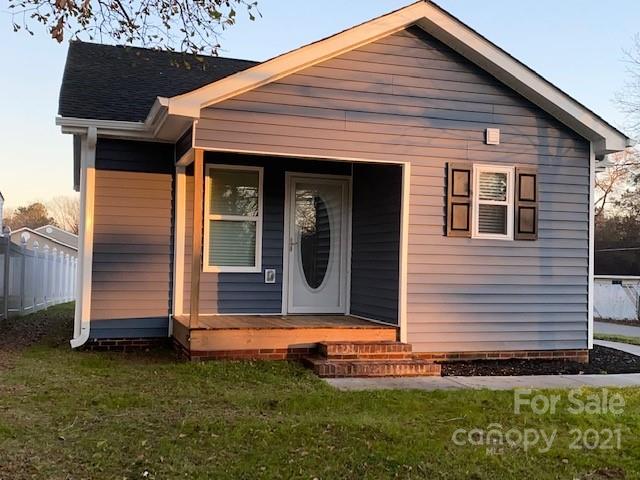 1599 Springdale Road Lancaster, SC 29720 - Photo 26 of 28 a front view of a house with garden