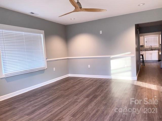 1599 Springdale Road Lancaster, SC 29720 - Photo 4 of 28 a view of a room with wooden floor and a window
