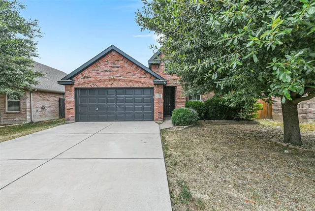 a view of backyard of house garage